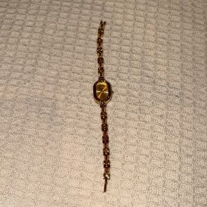 Gold-tone Ladies Bracelet Watch with Oval Face